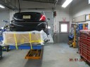Professional vehicle lifting equipment at Champion CARSTAR Collision, located at Hightstown, NJ, 08520, allows our damage estimators a clear view of all collision related damages.