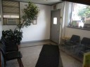 A relaxing cozy waiting area at our body shop, located at Brooklyn, NY, 11203 is a comfortable and inviting place for our guests.