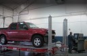 Professional vehicle lifting equipment at Robberson Collision Center, located at Bend, OR, 97701, allows our damage estimators a clear view of all collision related damages.