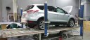 Professional vehicle lifting equipment at Rusty Eck Ford Body Shop, located at Wichita, KS, 67207, allows our damage technicians a clear view of what might be causing the problem.