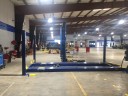 Professional vehicle lifting equipment at Car Guys Collision Repair - Corporate, located at Lady Lake, FL, 32159, allows our damage estimators a clear view of all collision related damages.