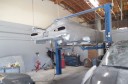 Professional vehicle lifting equipment at CARSTAR West Coast Collision Center, located at Riverside, CA, 92509, allows our damage estimators a clear view of all collision related damages.