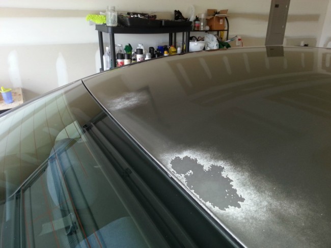 Peeling clearcoat on a car in a North Attleboro MA auto body repair shop