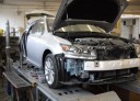 Fix Auto Interbay - Professional vehicle lifting equipment at Fix Auto Interbay, located at Seattle, WA, 98119, allows our damage technicians a clear view of what might be causing the problem.
