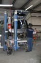 Professional vehicle lifting equipment at Gross & Son Paint & Body Shop, Inc., located at Pensacola, FL, 32505, allows our damage estimators a clear view of all collision related damages.